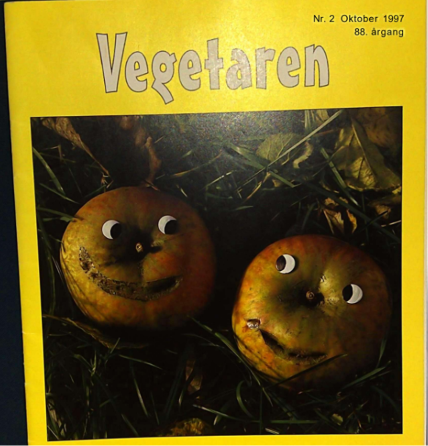 BIllede af bladet "Vegetaren" fra 1997. Det er gult og har et billede af to udskårne græskar i midten på en mørk baggrund. Græskarene har fået udskåret glade ansigter